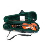 A small student's violin in carry case