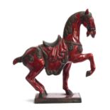 A mid century Italian Urbano Zaccagnini style Tang Horse, red glaze, one leg repaired, 32cm high