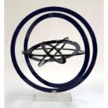 A lucite kinetic six ring sphere sculpture, 44cmH