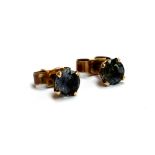 A pair of 9ct gold and sapphire stud earrings, 0.7g