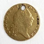 A George III gold half guinea 1803