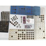 A mixed lot of coins to include pre 1947 silver, coin collectors folders, Cook Islands great