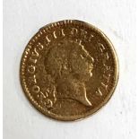 A George III gold one third guinea, 1804