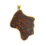 A large boulder opal pendant mounted in gold, tests as 18ct, 16.9g