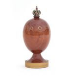A Theo Fabergé (1922-2007) St. Petersburg Collection 'Eternity Egg', turned bubinga wood