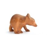 Virgil Ledford (1940-2018), a carved Native American wooden figurine of a bear cub, signed to
