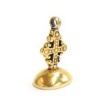 A Victorian 18ct gold fob seal in the form of a granulated cross, the carved agate intaglio