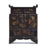 A Japanese Meiji era lacquered kodansu table cabinet and stand, decorated with a sparrow amongst
