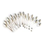 Twenty George III Old English pattern silver dessert spoons, various dates and makers, eighteen with