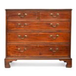 A George III mahogany and line inlaid chest of two short over three graduating drawers, on bracket