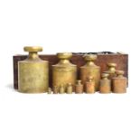 A 19th century mahogany cased set of large brass weights, by Oertling, measuring from 500 troy oz