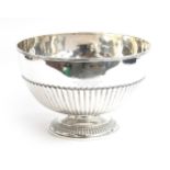 A large silver rose bowl by Asprey & Co Ltd, London 1899, half fluted body on a fluted spreading