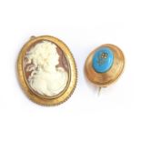 A gold mounted cameo brooch (af), tests as 15ct, 5cm long, 11.8g; together with a gold and enamel
