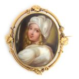 A 19th century gold mounted brooch, the hand painted porcelain plaque depicting Beatrice Cenci,