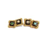 A pair of early 19th century gold and enamel cufflinks, test as 15ct or higher, with square chased