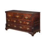 A George III mahogany mule chest c.1780, with hinged lid above the arrangement of drawers and