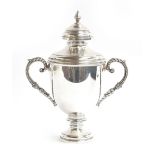 A large silver twin handled cup and cover by Asprey & Co Ltd, London 1993, 27cm high, 26ozt