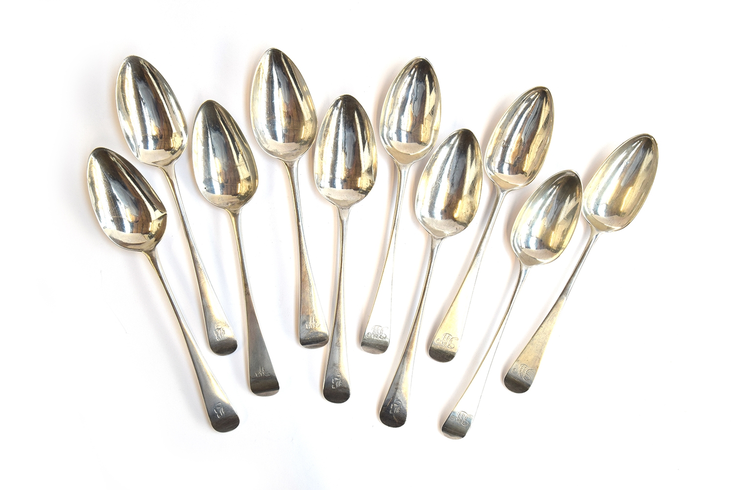 Ten George III Old English pattern table spoons, six by William Bateman I (1815 and 1824), the