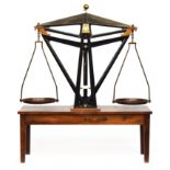 An impressive 19th century industrial cast iron and steel balance, by Oertling, set into a later
