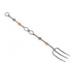 A Cotswold school steel and copper three pronged toasting fork, probably Ernest Gimson, made by