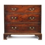 A George III mahogany chest of drawers, caddy top over three graduating drawers, on bracket feet,