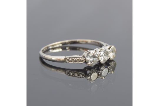 An 18ct white gold diamond trilogy ring, illusion shoulders, the total diamond carat weight - Image 2 of 3