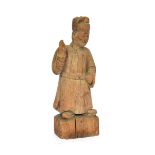 A 19th century Chinese carved wood figure of Scholar, Fujian Province, with remnants of original