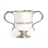 A George II silver two-handled cup by Thomas Mason, London 1736, of plain form with ribbed girdle