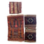 A west Afghan 'mosque' prayer rug, mid 20th century, 109x70cm; together with two saddle bags, one