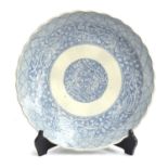 A large Chinese export blue and white charger, profuse floral decoration, 44cm diameter