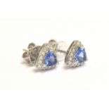 A pair of 18ct white gold trillion cut tanzanite and diamond earrings, 0.9cm wide, 3.2g