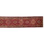 A very long Gharadjeh runner rug, 480x76cm