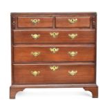 An 18th century bachelor's chest, the foldover top above two short and three long drawers, on