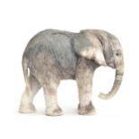 Nick Mackman (b.1972), a raku sculpture of a baby elephant, incised signature to leg, 13.5cm high
