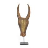 A carved wood and bronze buffalo mask, Mali, 74cm long, standing 92cm high on current mount