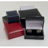 A pair of silver cufflinks; together 4 presentation boxes