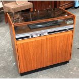 An HMV hi-fi cabinet with Garrard SP25 MK IV turntable; together with a pair of teak speakers