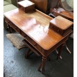 A 19th century mahogany dressing table, two pier drawers, moulded top over two frieze drawers, on