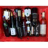 11 bottles of various wine (in a red plastic crate)