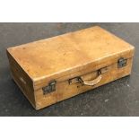 A vintage pigskin suitcase containing a quantity of cross stitch materials, stamped Mrt McLean,