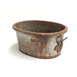 An oval steel planter with twin carry handles, 46cmW