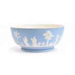 A large 19th Century Wedgwood Jasperware bowl, decorated with the 'Sacrifice' scene on a pale blue