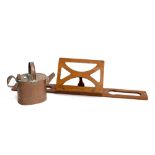 A vintage Army and Navy copper watering can; together with the Bershaw book rest