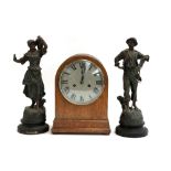 A pair of spelter figures after George Maxim, 'Faucheur' and 'Moissonneuse', each approx. 38cmH;