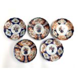 Five late 19th/early 20th century imari dishes, one repaired, each approx. 21.5cmD