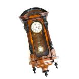 An early 20th century mahogany cased wall clock, with enamel dial and pendulum, 62cmL