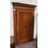 A George III oak corner cupboard, the door with central star inlay, 63cmW, 90cmH