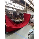 A very large red velvet style stage curtain, approx. 420x700cm