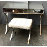A Barcelona style chrome and mirrored dressing table, with two drawers, 101x50x76cmH; together