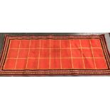 A small machine woven hall rug, 214x91cm